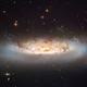 Illustration for article titled Mangled Galaxies Racing At Over 6 Million Miles Per Hour